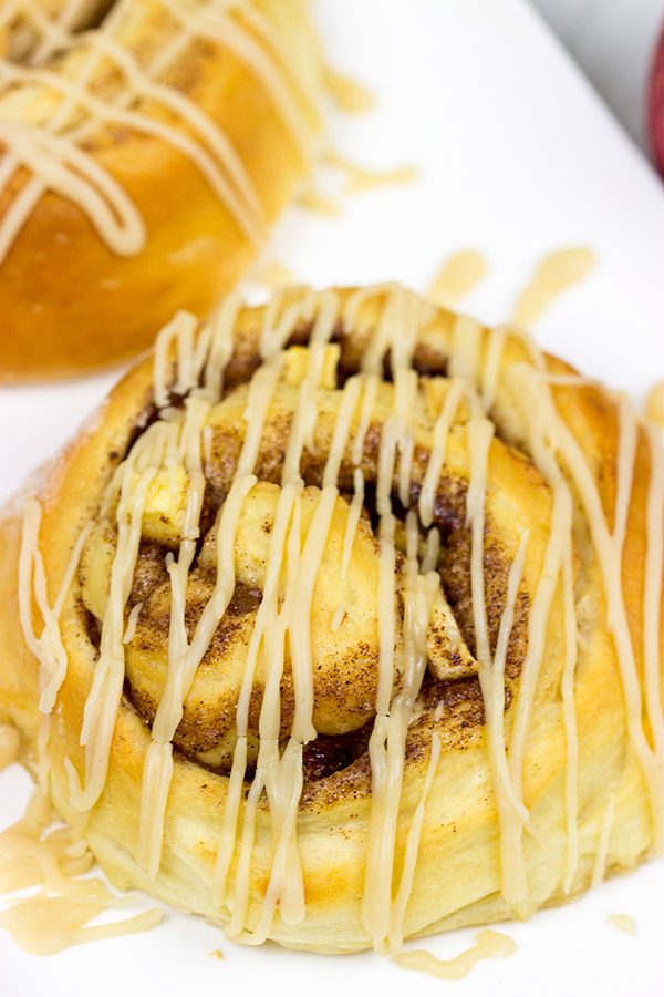 These Caramel Apple Cinnamon Rolls are the perfect way to welcome in the cooler October temperatures!
