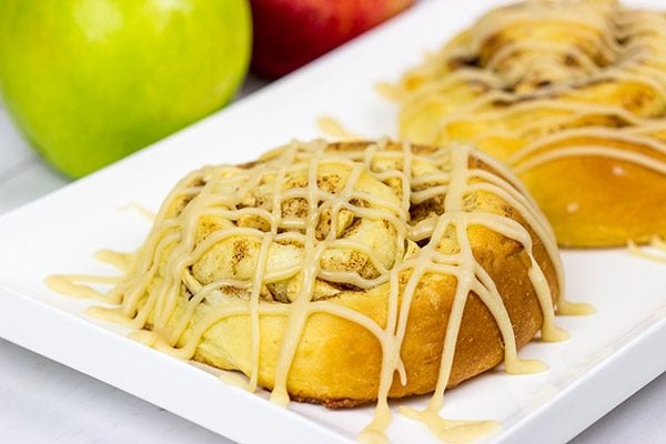 These Caramel Apple Cinnamon Rolls are the perfect way to welcome in the cooler October temperatures!