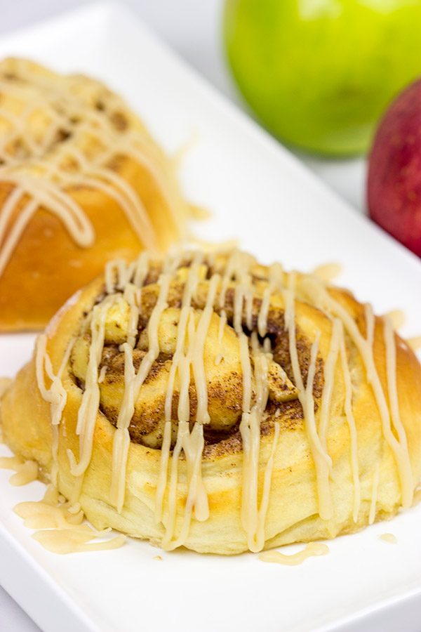 These Caramel Apple Cinnamon Rolls are the perfect way to welcome in the cooler October temperatures!