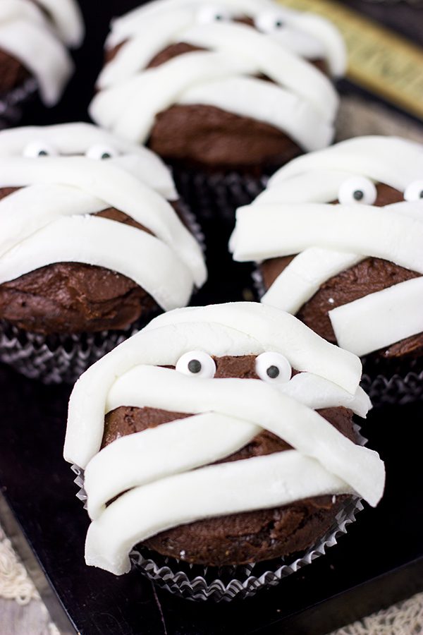 Who's watching you? Is it ghosts and goblins? If you're lucky, it's these Chocolate Mummy Cupcakes!