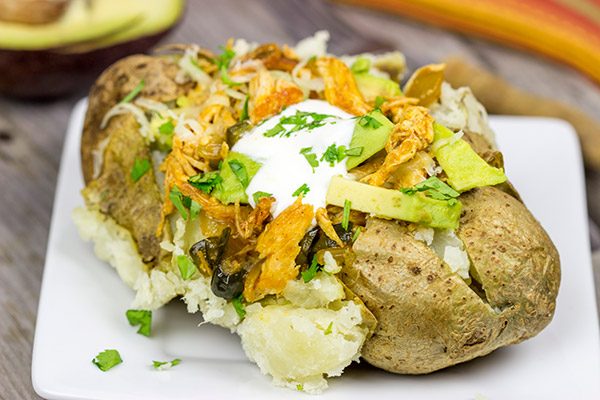 Who says you need tortillas for tacos? These Enchilada Baked Potatoes make for a delicious dinner!