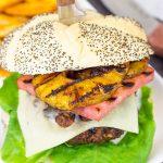 Piled high with teriyaki pineapples and grilled ham, this Grilled Aloha Burger deserves a spot on your dinner menu!