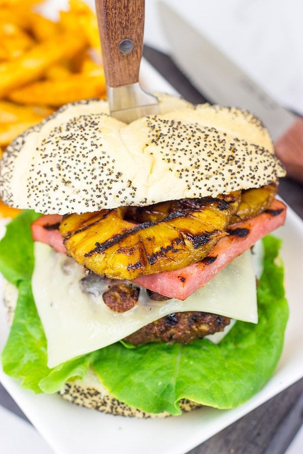 Piled high with teriyaki pineapples and grilled ham, this Grilled Aloha Burger deserves a spot on your dinner menu!