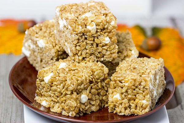 Turn a childhood favorite into the perfect seasonal snack with these Pumpkin Spice Rice Crispy Treats!