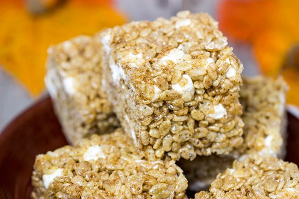 Turn a childhood favorite into the perfect seasonal snack with these Pumpkin Spice Rice Crispy Treats!