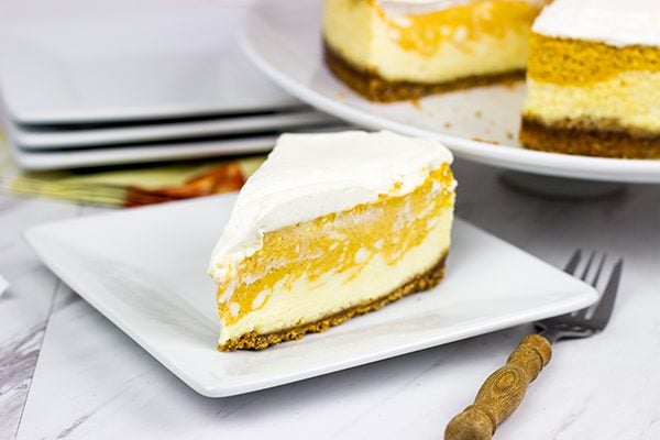 Love cheesecake? Love pumpkin spice? Then this Pumpkin Swirl Cheesecake is calling your name! It's the perfect Autumn dessert!