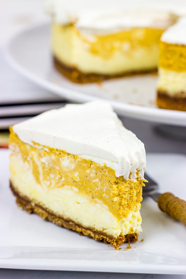 Love cheesecake? Love pumpkin spice? Then this Pumpkin Swirl Cheesecake is calling your name! It's the perfect Autumn dessert!