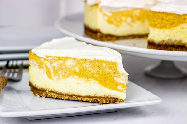 Love cheesecake? Love pumpkin spice? Then this Pumpkin Swirl Cheesecake is calling your name! It's the perfect Autumn dessert!