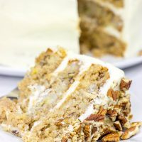 This classic Southern Hummingbird Cake is filled with pecans, bananas and pineapples and topped with a tasty cream cheese frosting!