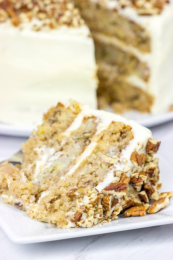 This classic Southern Hummingbird Cake is filled with pecans, bananas and pineapples and topped with a tasty cream cheese frosting!