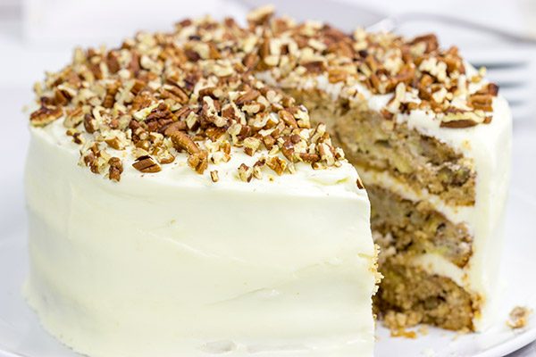 This classic Southern Hummingbird Cake is filled with pecans, bananas and pineapples and topped with a tasty cream cheese frosting!