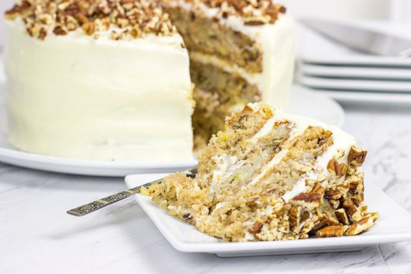 This classic Southern Hummingbird Cake is filled with pecans, bananas and pineapples and topped with a tasty cream cheese frosting!