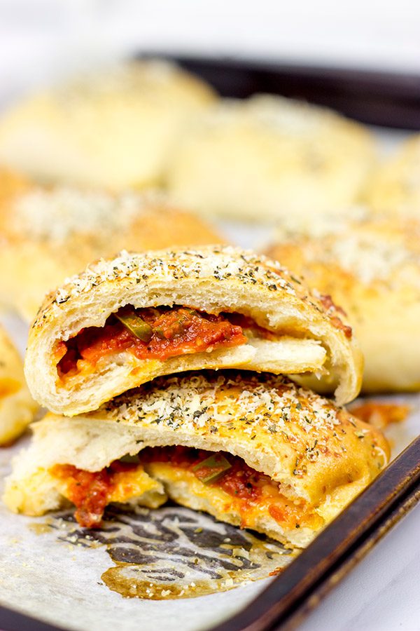Who says pizza needs to be served by the slice? These Stuffed Pepperoni Pizza Rolls are a tasty twist on a classic!