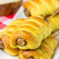 Take this street food to a whole new level with these Baked Cheddar Brat Corndogs!