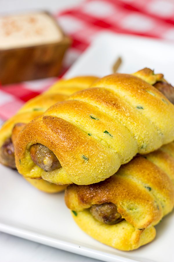 Take this street food to a whole new level with these Baked Cheddar Brat Corndogs!