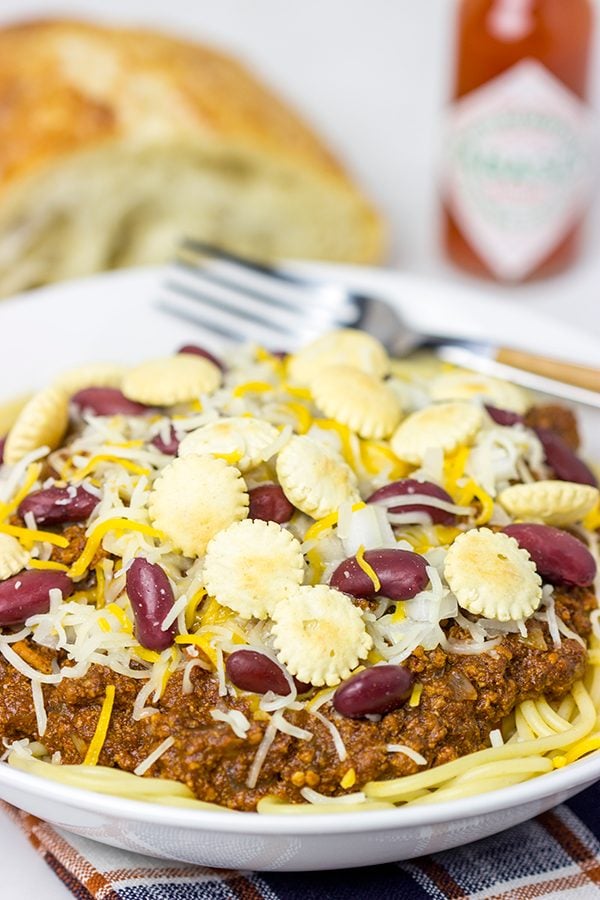 Chili served over spaghetti? Yup, it's the Cincinnati way! Whip up a batch of this Slow Cooker Cincinnati Chili for dinner tonight!