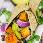 These Southwestern Veggie Wraps are packed with layers of flavor...starting with seasoned sweet potatoes!