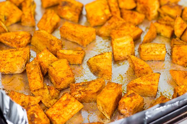 These Southwestern Veggie Wraps are packed with layers of flavor...starting with seasoned sweet potatoes!