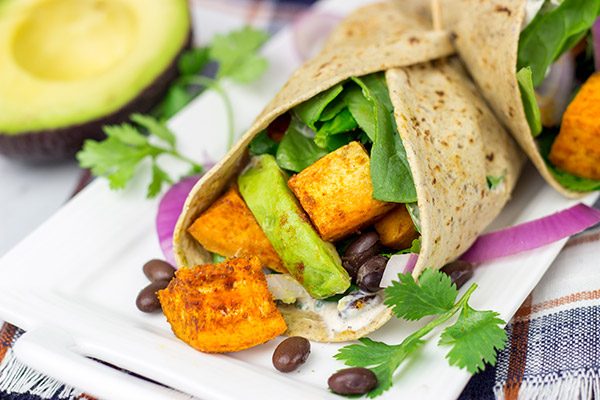 These Southwestern Veggie Wraps are packed with layers of flavor...starting with seasoned sweet potatoes!