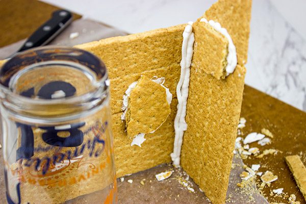 Have you ever made a Holiday Gingerbread House? Here are some tips and tricks for this classic Christmas activity!