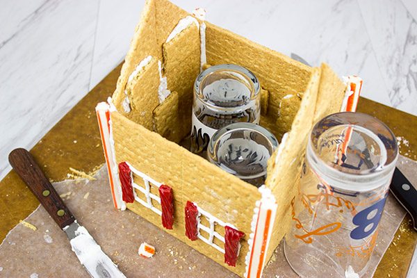 Have you ever made a Holiday Gingerbread House? Here are some tips and tricks for this classic Christmas activity!
