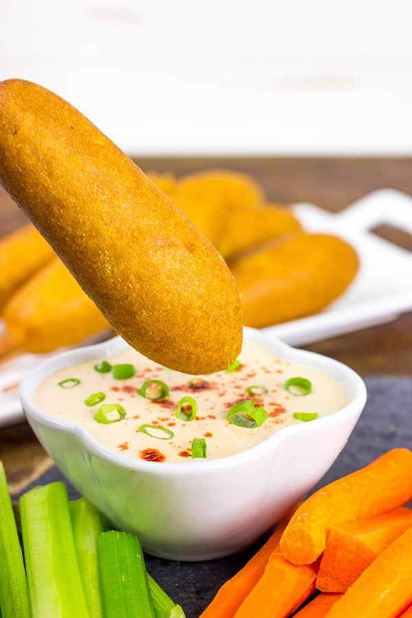 Food on a stick always tastes better! These Corndogs with Creamy Honey Buffalo Sauce are quite tasty!