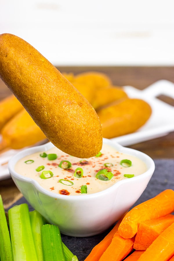 Food on a stick always tastes better! These Corndogs with Creamy Honey Buffalo Sauce are quite tasty!