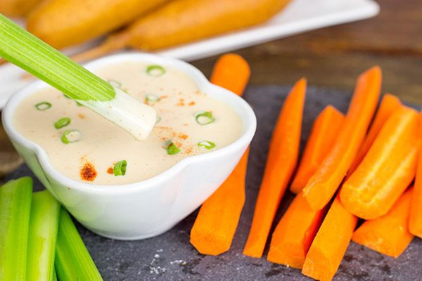 Food on a stick always tastes better! These Corndogs with Creamy Honey Buffalo Sauce are quite tasty!