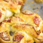 Soft, chewy homemade pretzels topped with tasty pepperoni...these Pepperoni Soft Pretzels make for an excellent appetizer while watching the big game!