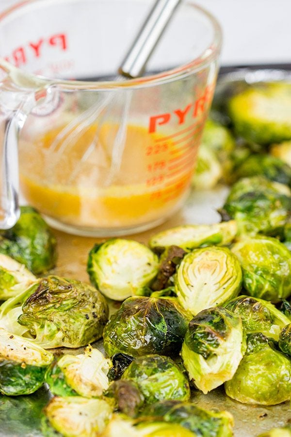 Buffalo sauce on oven-roasted veggies? Yup! These Roasted Buffalo Brussels Sprouts are delicious!