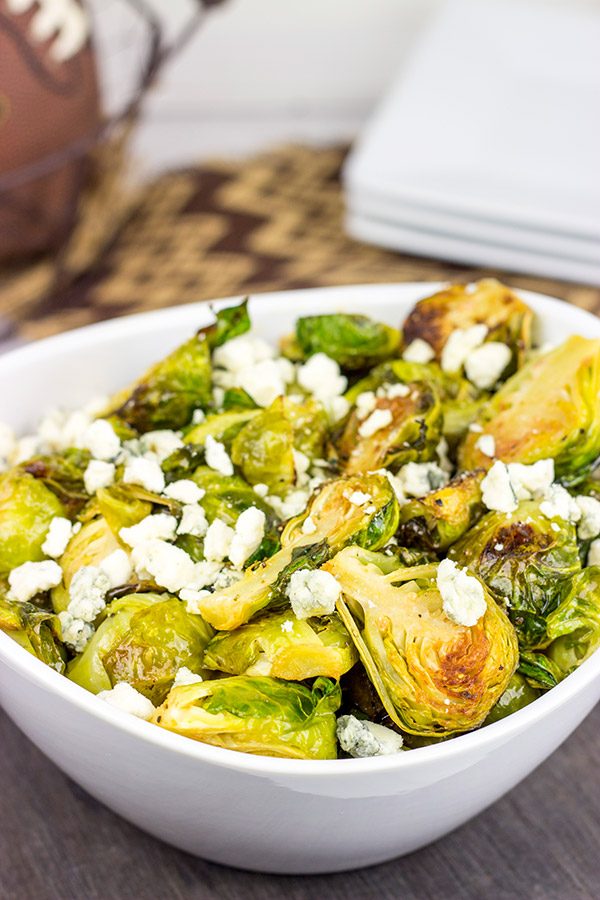 Buffalo sauce on oven-roasted veggies? Yup! These Roasted Buffalo Brussels Sprouts are delicious!