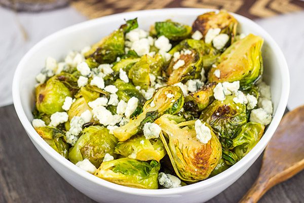 Buffalo sauce on oven-roasted veggies? Yup! These Roasted Buffalo Brussels Sprouts are delicious!