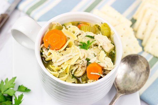 This Slow Cooker Chicken Noodle Soup is perfect for cold winter days when you just want to curl up on the couch with a good book!