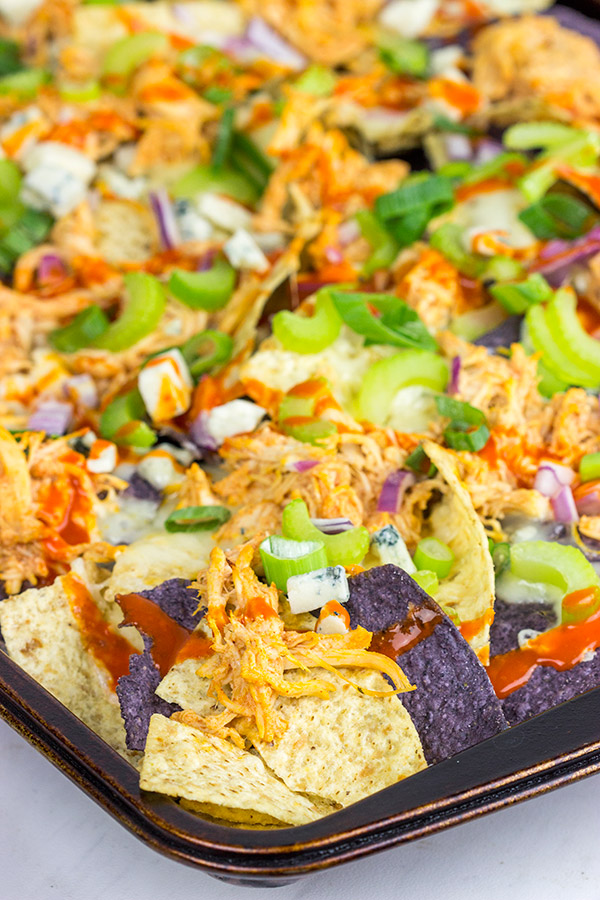 These Buffalo Chicken Nachos are an epic appetizer to serve while watching football!
