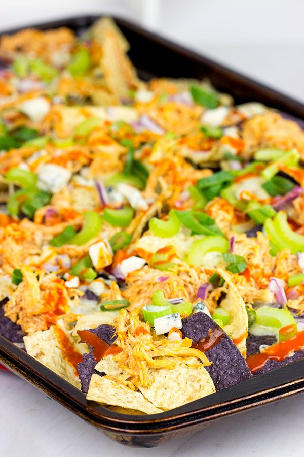 These Buffalo Chicken Nachos are an epic appetizer to serve while watching football!