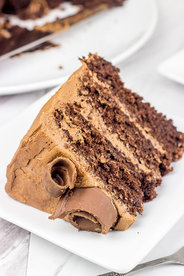 This Chocolate Chocolate Cake is a classic! This rich, moist cake is topped with a creamy chocolate frosting for a sweet treat that's sure to put you in a good mood!