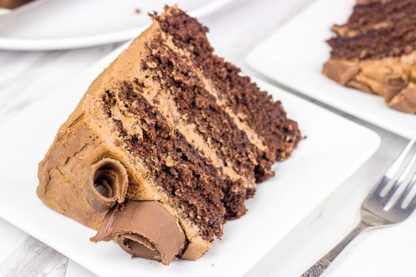 This Chocolate Chocolate Cake is a classic! This rich, moist cake is topped with a creamy chocolate frosting for a sweet treat that's sure to put you in a good mood!