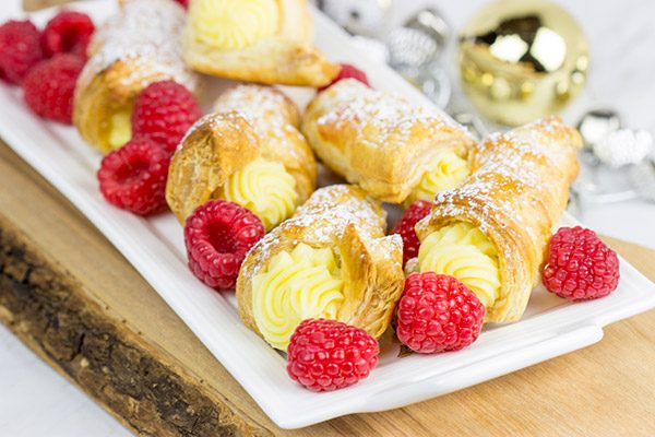These White Chocolate Raspberry Cream Horns are a fun sweet treat to serve during the holidays!