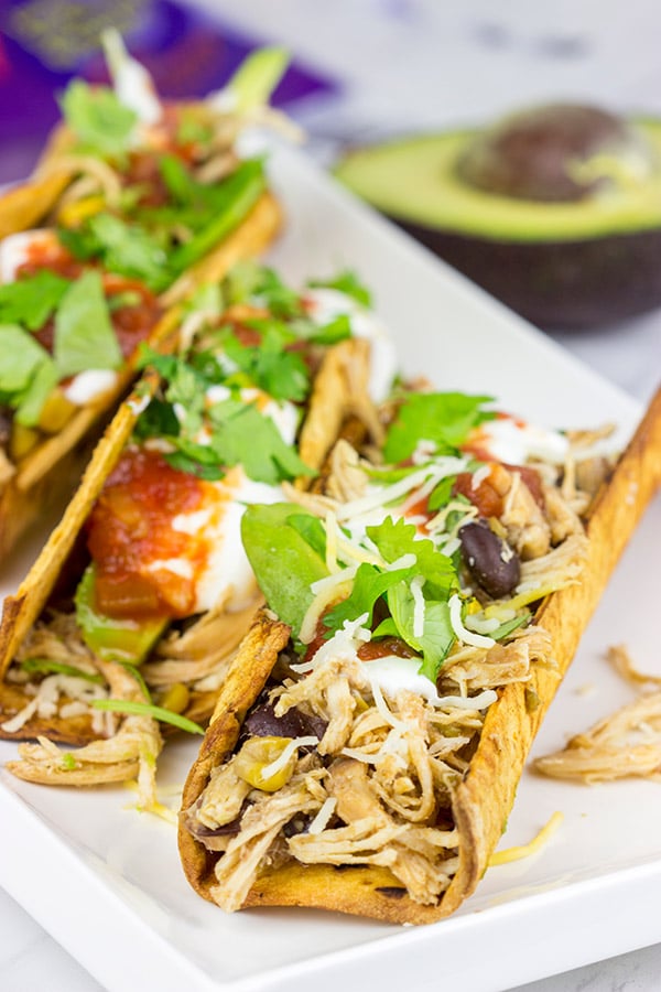 These Slow Cooker Southwestern Chicken Tacos are quick, easy and delicious...the perfect comfort food for a cold winter day!