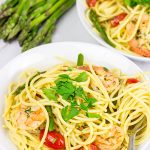 This Spaghetti with White Wine Garlic Sauce is tasty enough for a family feast, or just a casual night sitting by the fireplace!