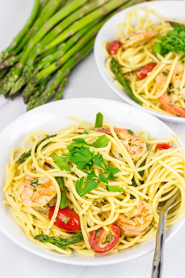 This Spaghetti with White Wine Garlic Sauce is tasty enough for a family feast, or just a casual night sitting by the fireplace!