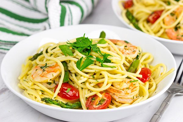 This Spaghetti with White Wine Garlic Sauce is tasty enough for a family feast, or just a casual night sitting by the fireplace!