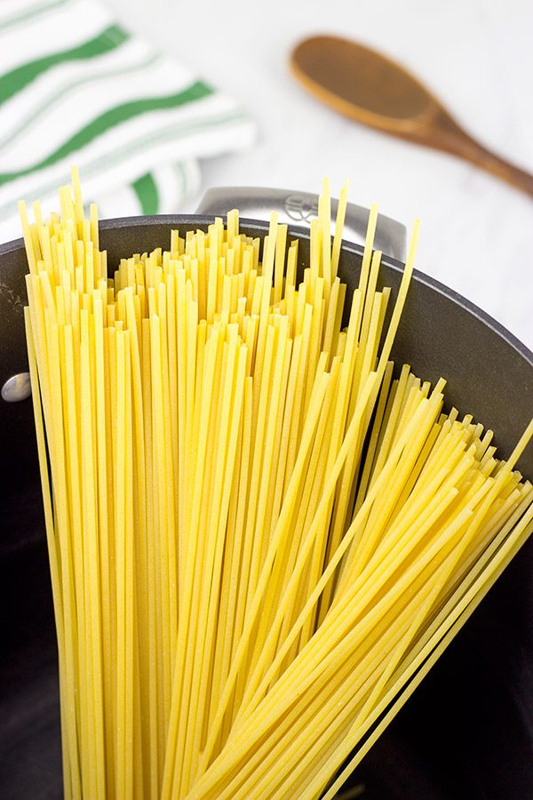 This Spaghetti with White Wine Garlic Sauce is tasty enough for a family feast, or just a casual night sitting by the fireplace!