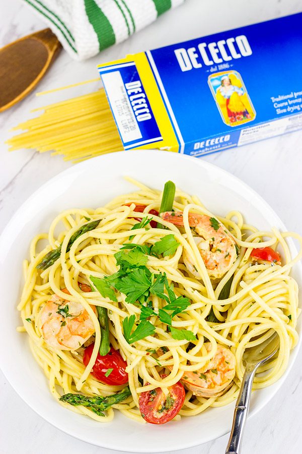 This Spaghetti with White Wine Garlic Sauce is tasty enough for a family feast, or just a casual night sitting by the fireplace!