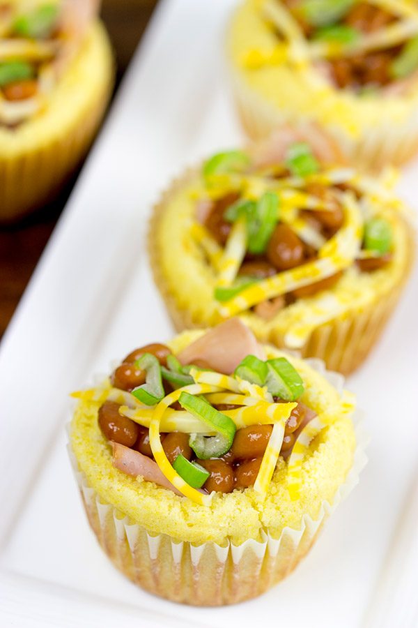 Think beyond the sandwich...by using cornbread bowls! These Ham and Baked Beans in Cornbread Bowls are a fun twist on a classic!
