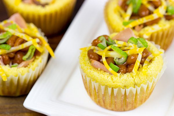 Think beyond the sandwich...by using cornbread bowls! These Ham and Baked Beans in Cornbread Bowls are a fun twist on a classic!
