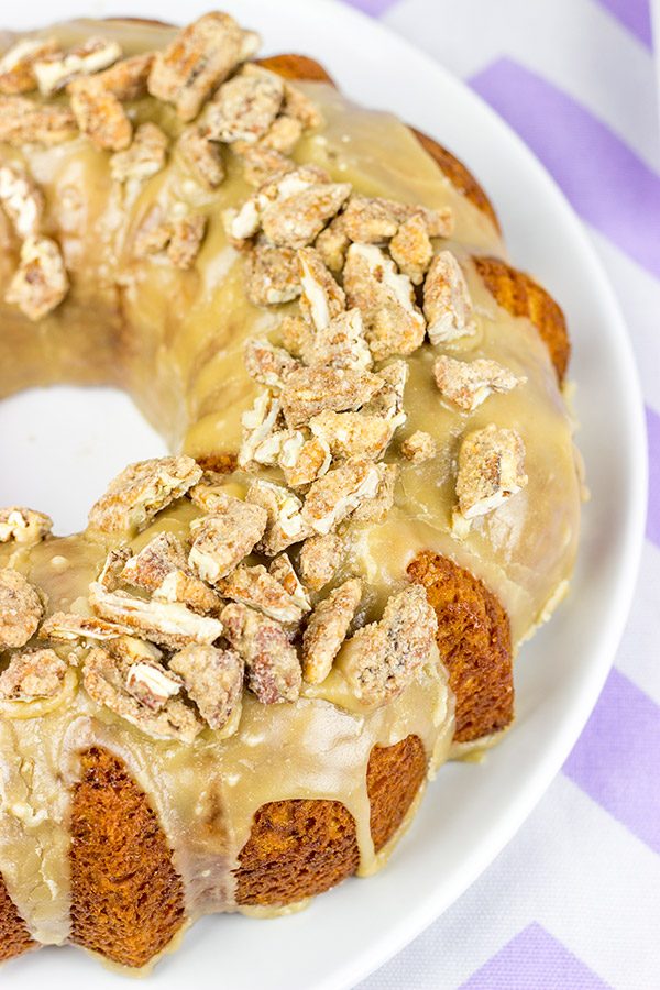 This Pecan Praline Bundt Cake features a warm praline frosting poured over a moist cake. Oh, and there's some sugared pecans in there, too! Enjoy!