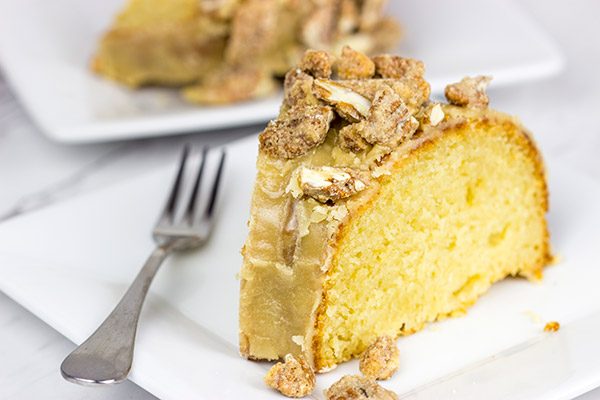 This Pecan Praline Bundt Cake features a warm praline frosting poured over a moist cake. Oh, and there's some sugared pecans in there, too! Enjoy!