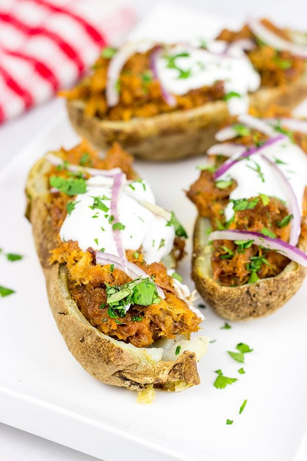 Forget the sandwich! These BBQ Pulled Pork Potato Skins are a tasty way to serve up pulled pork!
