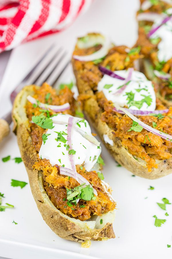 Forget the sandwich! These BBQ Pulled Pork Potato Skins are a tasty way to serve up pulled pork!
